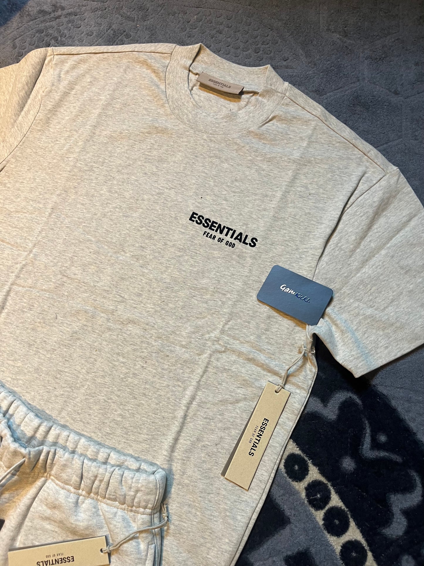 Fear of God
SS22 Essentials Short set LightOat (Black Velvety Print)